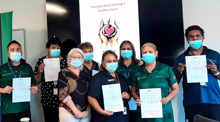 Members of the ACHT and community advisory groups show off their training certificates with Helen McLean, Heart Foundation.