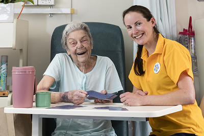 Photograph of Forget Me Not volunteer with patient