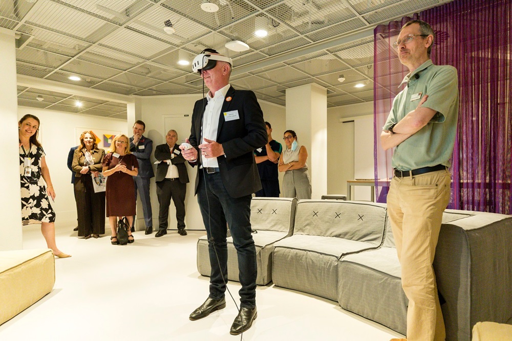 Minister Stephen Dawson tests some new technology at the Innovation Hub. 